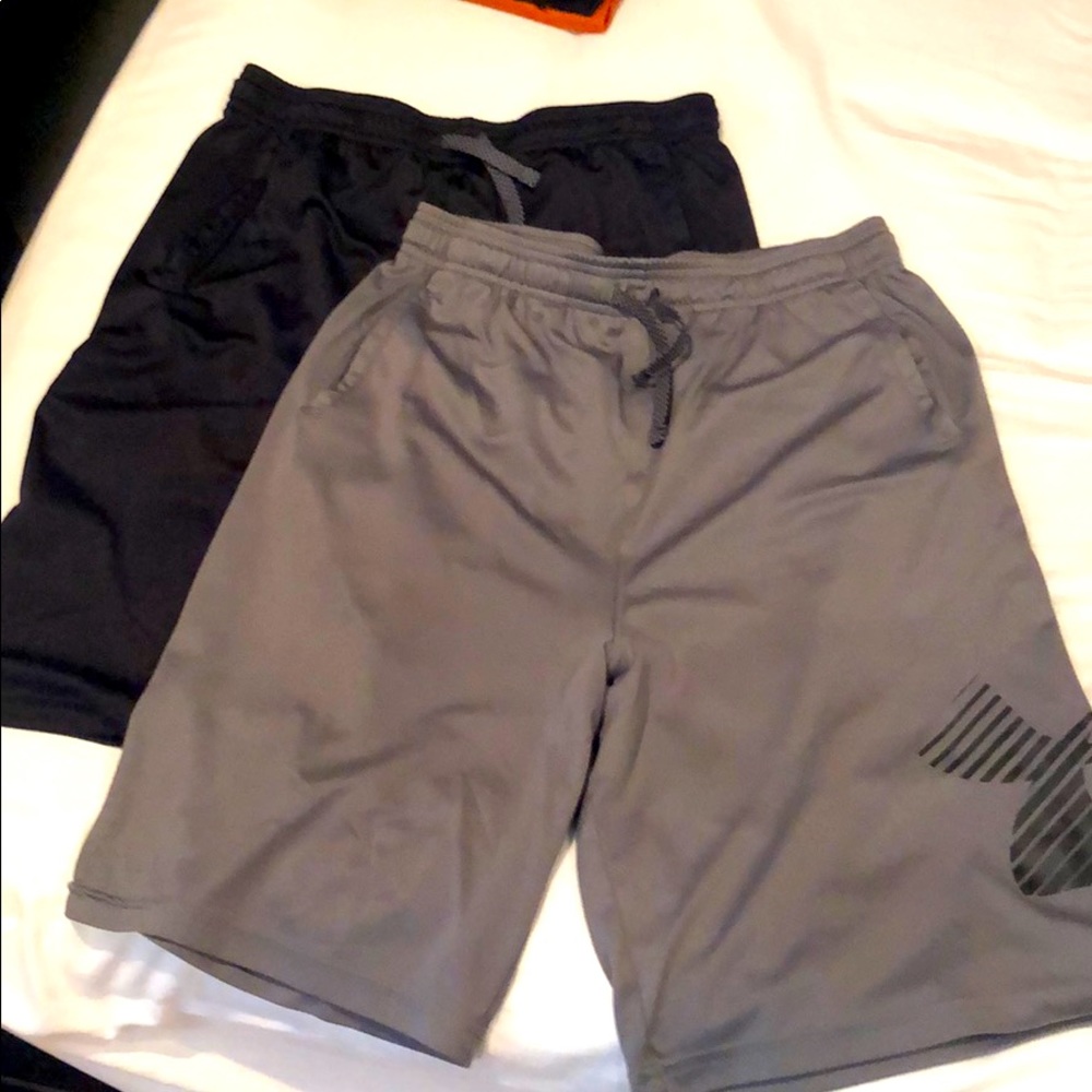 *Two pair Youth XL Under Armour Heatgear shorts*
